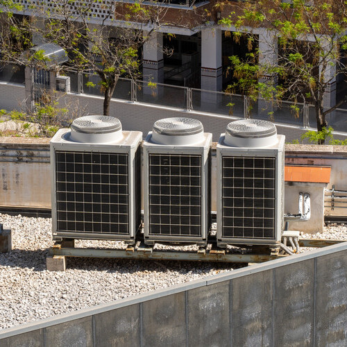 commercial ac units on the top of a building